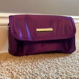 Purple Younique convertible clutch/purse. NWOT. Never used.